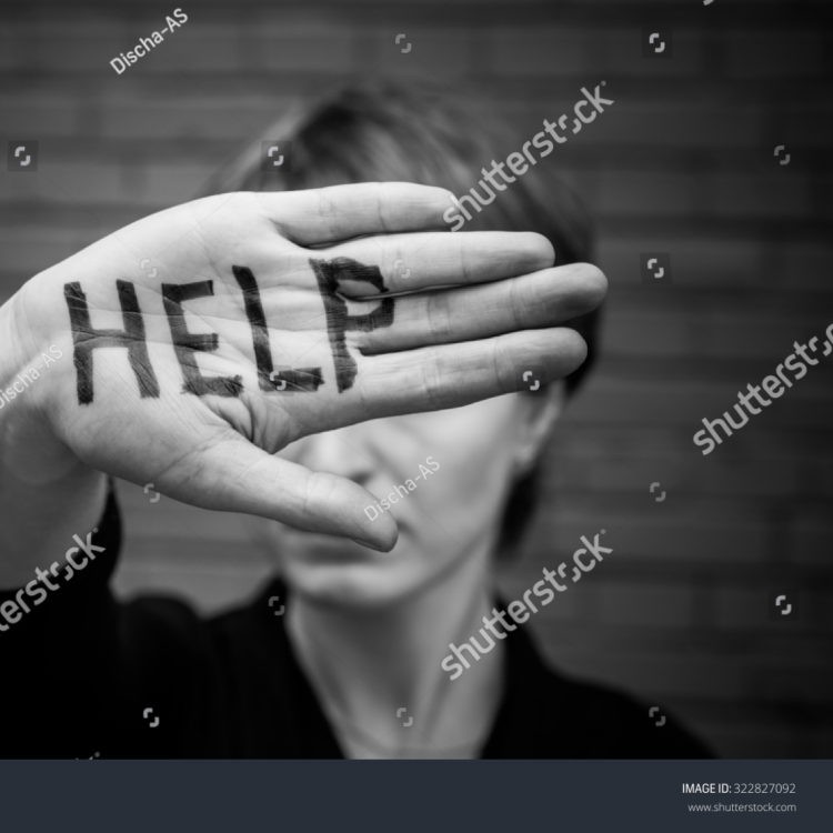 stock-photo-a-woman-covers-her-face-with-his-hand-on-his-hand-written-in-black-marker-help-322827092-750x750